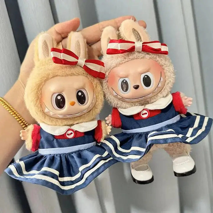 Seasonal Style for Your Labubu: Dressing Up for Every Occasion 3 Labubu doll wearing fuzzy white hat and pink outfit, ready for a party