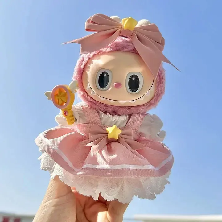 DIY Labubu Outfits: Simple No-Sew & Easy Sewing Projects 2 Labubu doll wearing pink overalls and fuzzy hat