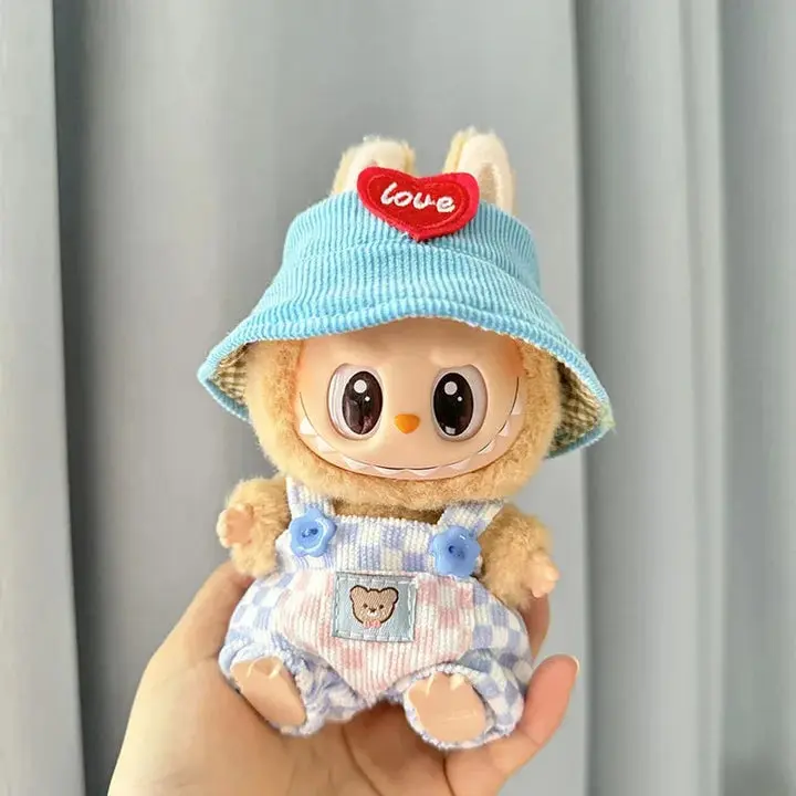 Seasonal Style for Your Labubu: Dressing Up for Every Occasion 4 Labubu doll wearing yellow fuzzy outfit with angel wings