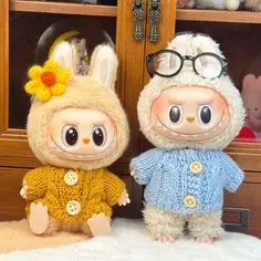 Styling Your Labubu: A Beginner's Guide to Doll Fashion 1 Two Labubu dolls wearing cozy knit sweaters