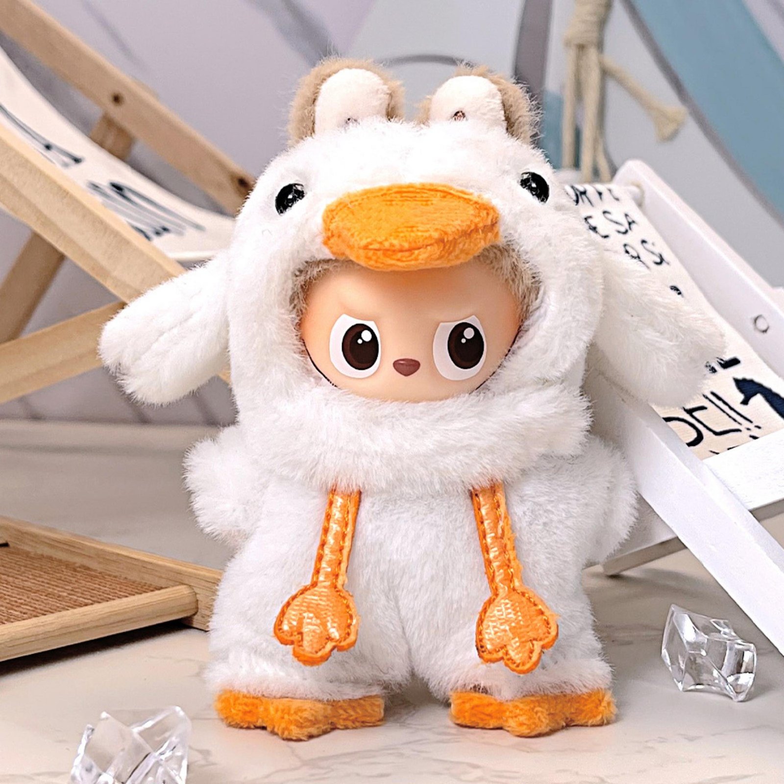 Labubu wearing an adorable, fluffy duck plush outfit.